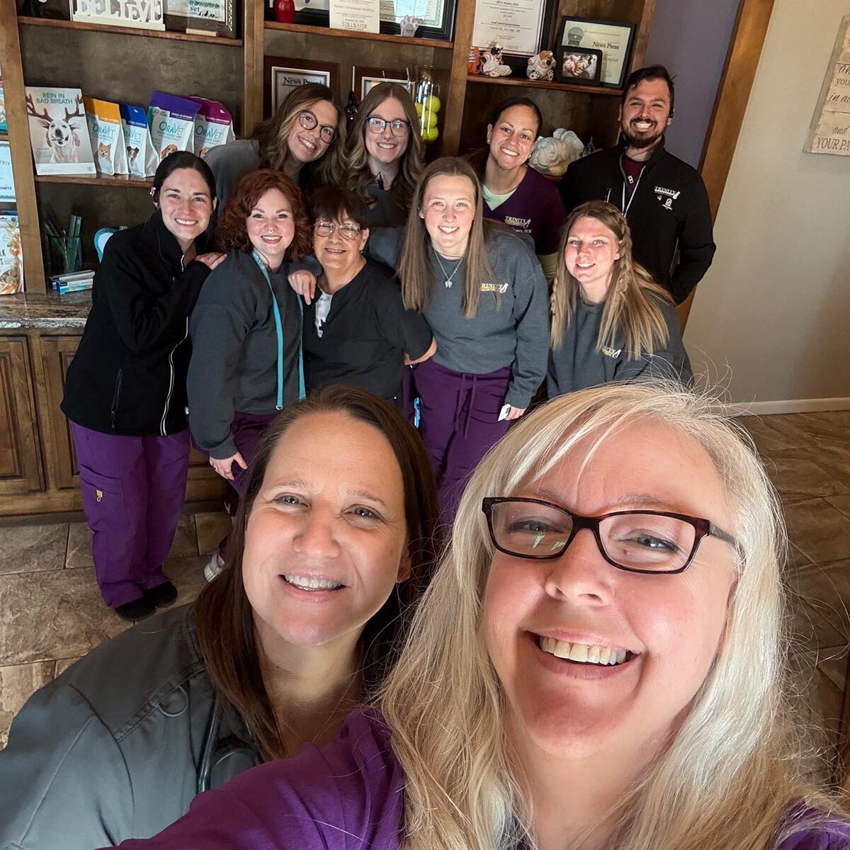 Trinity Veterinary Hospital Team Trinity Veterinary Hospital team smiling and posing for selfie